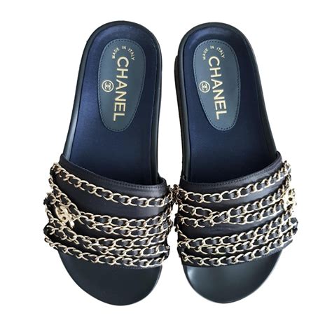 chanel black slide sandals.